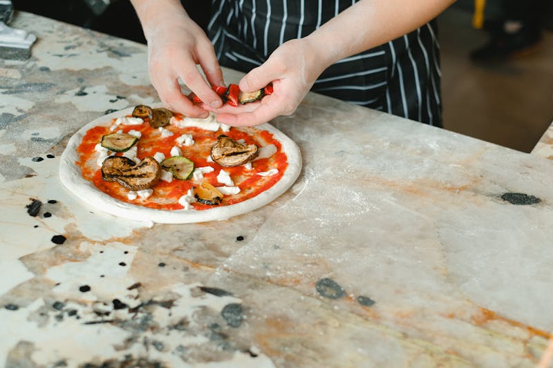 Pizza and pasta combo on restaurant table